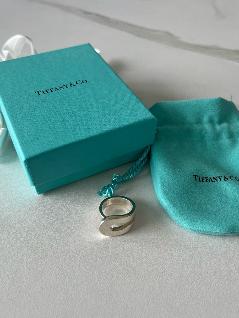 Tiffany & Co. Silver Ring with Iconic Tiffany Blue Pouch and box
